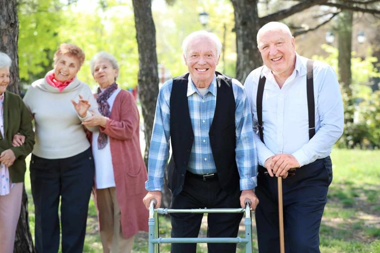 Happy residents enjoying the outdoors at a skilled nursing facility